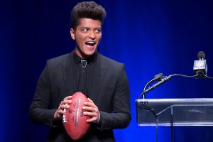 Singer Bruno Mars speaks at the Super Bowl half time press conference in New York