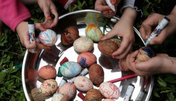 Egyptian children color eggs in the al-J...