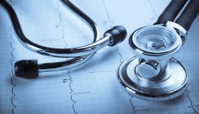 Stethoscope and EKG Representing Cardiac Checkup