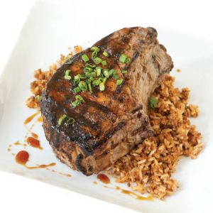 Double-Cut Pork Chop and Dirty Rice