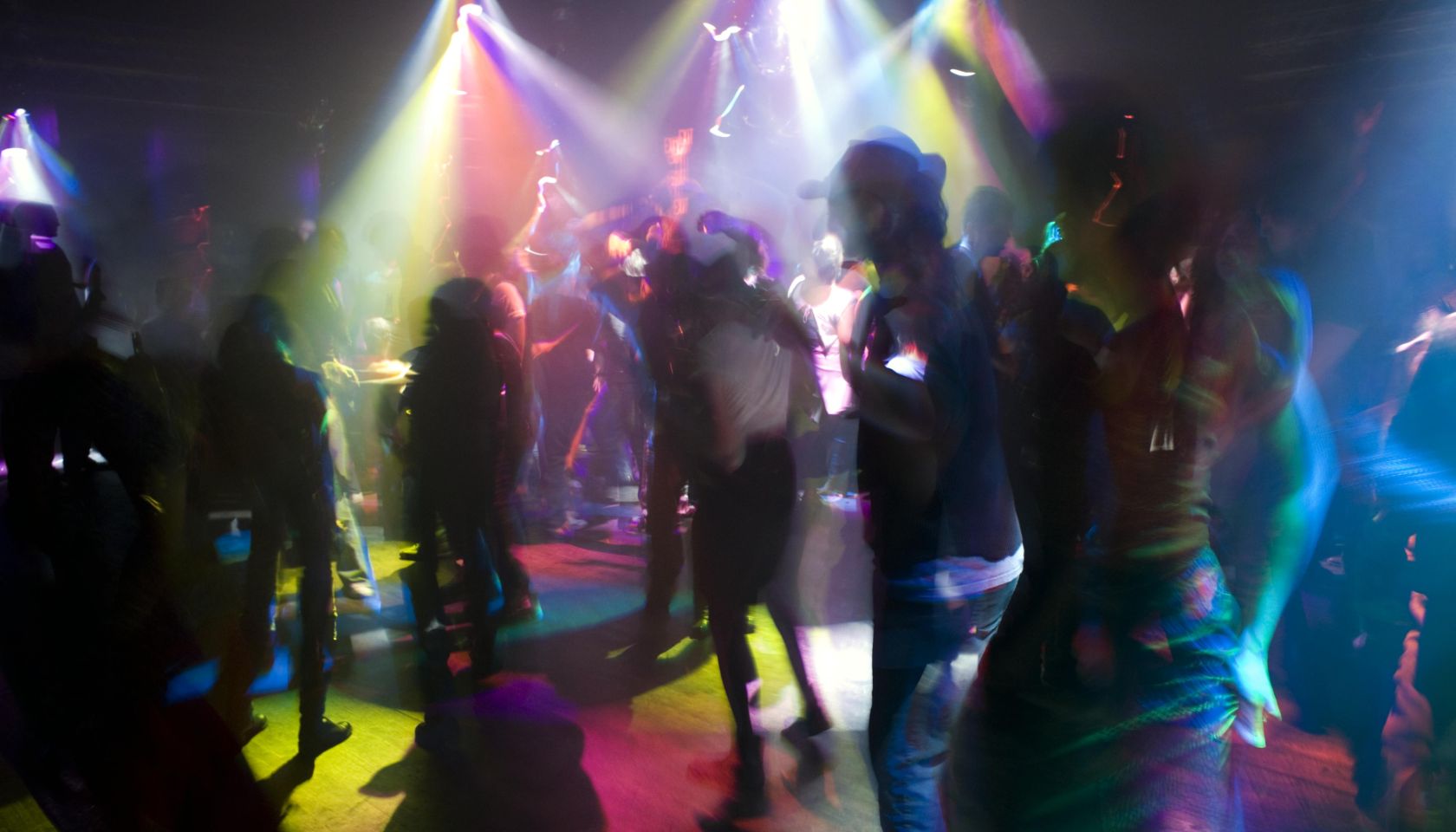 People dancing in night club