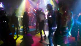 People dancing in night club