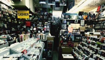 Compact Discs On Shelf At Shop