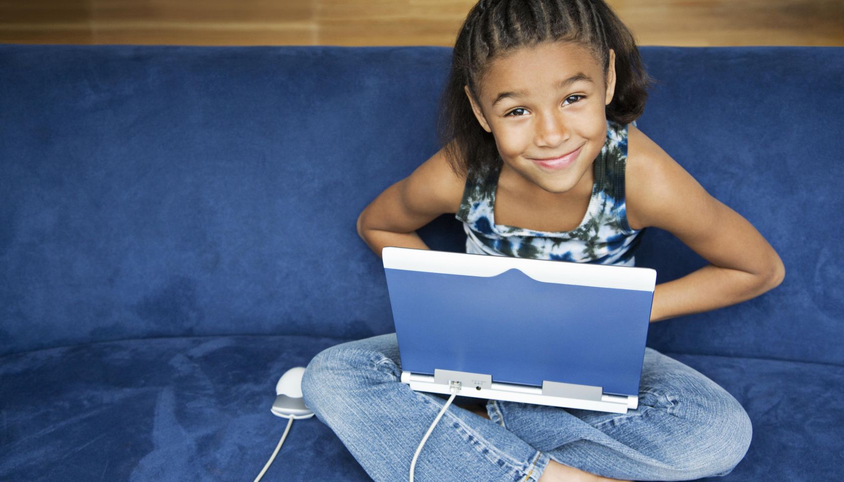 African American girl working on lap top computer