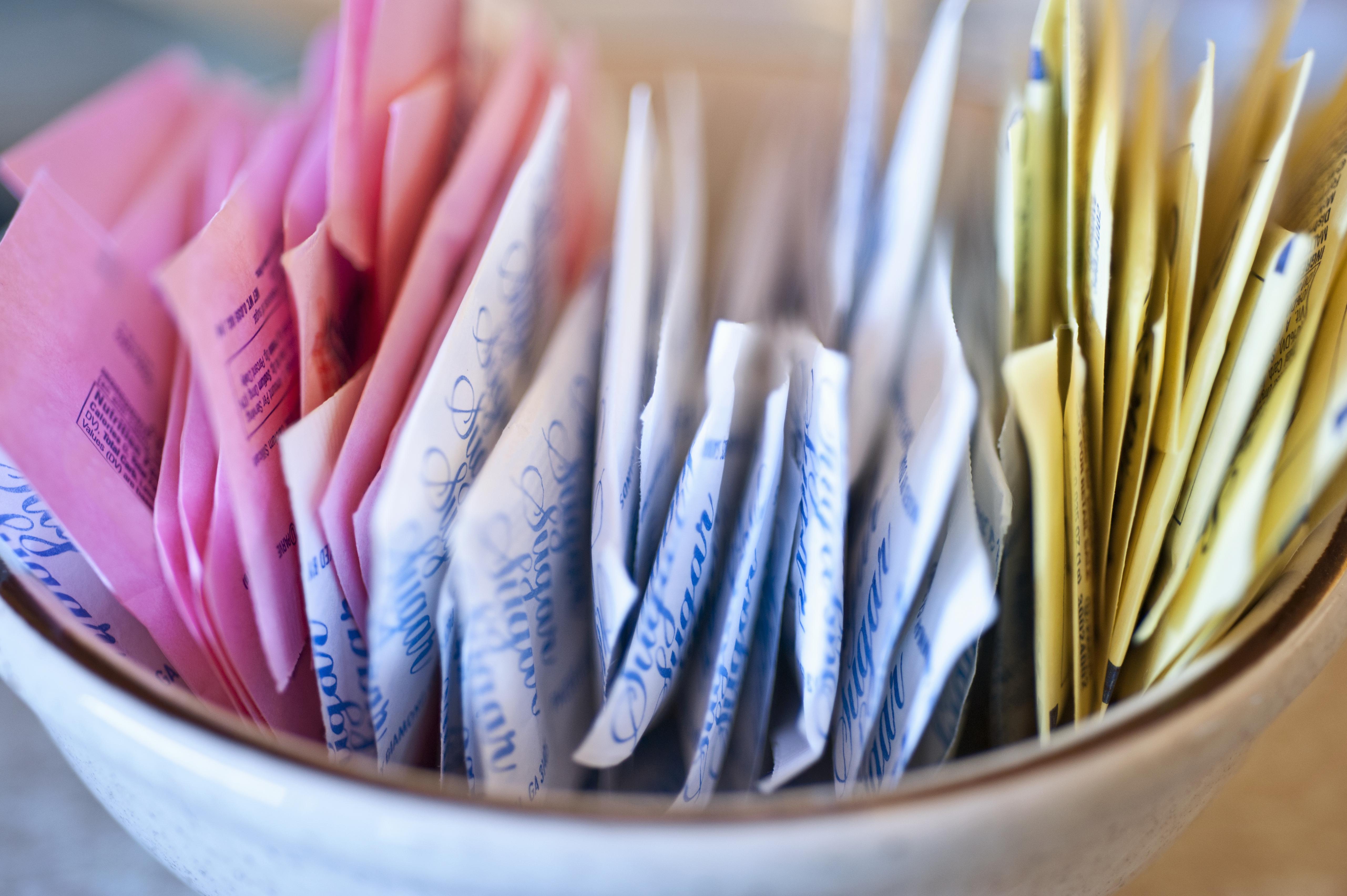 Close-up of packets of sugar