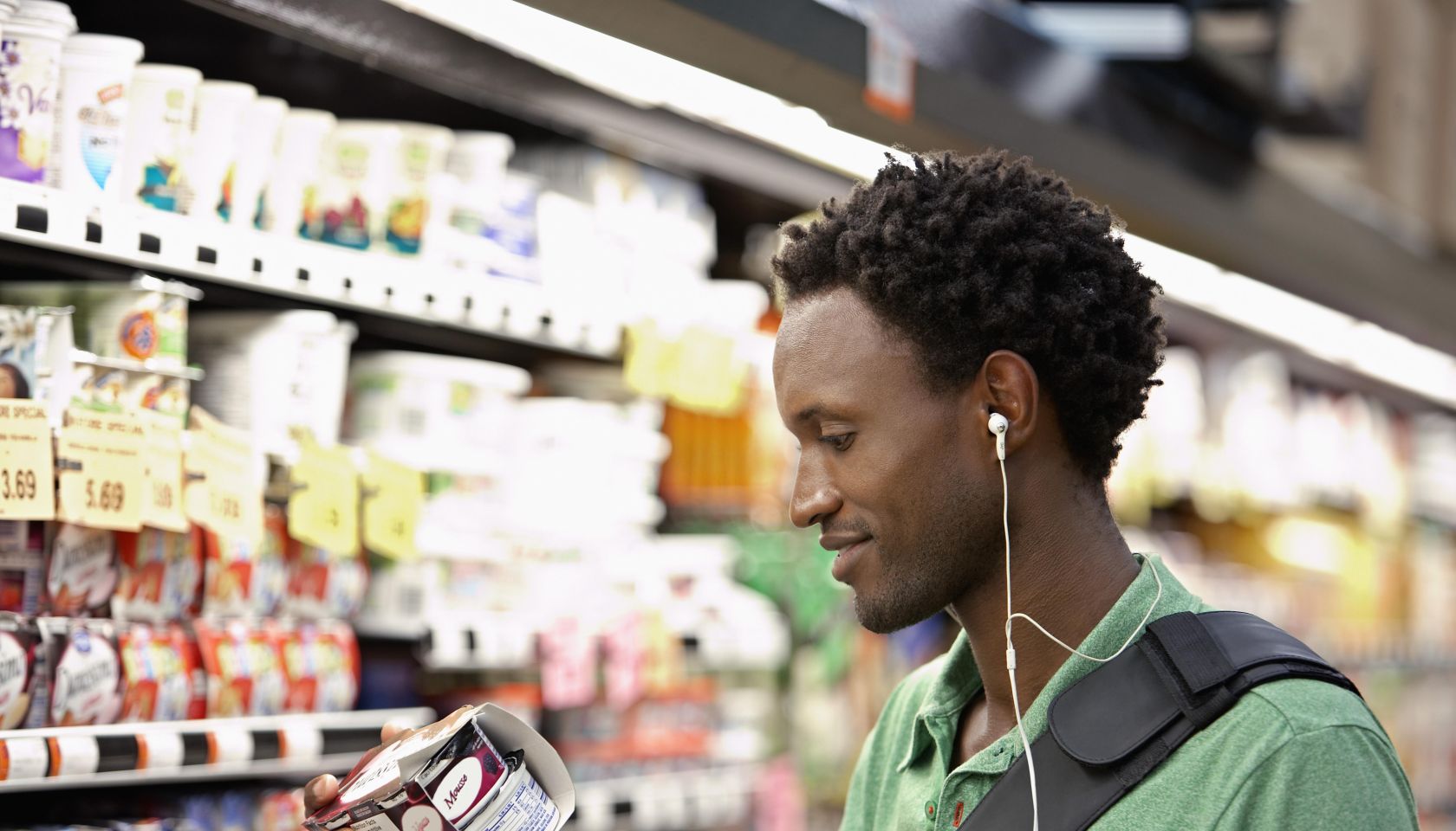 Man Reading Nutrition Label