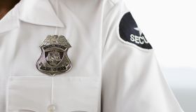 Security guard wearing badge
