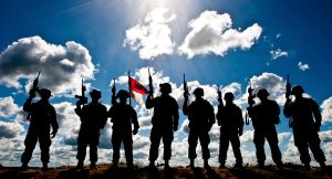 Silhouette of soldiers from the U.S. Army National Guard.