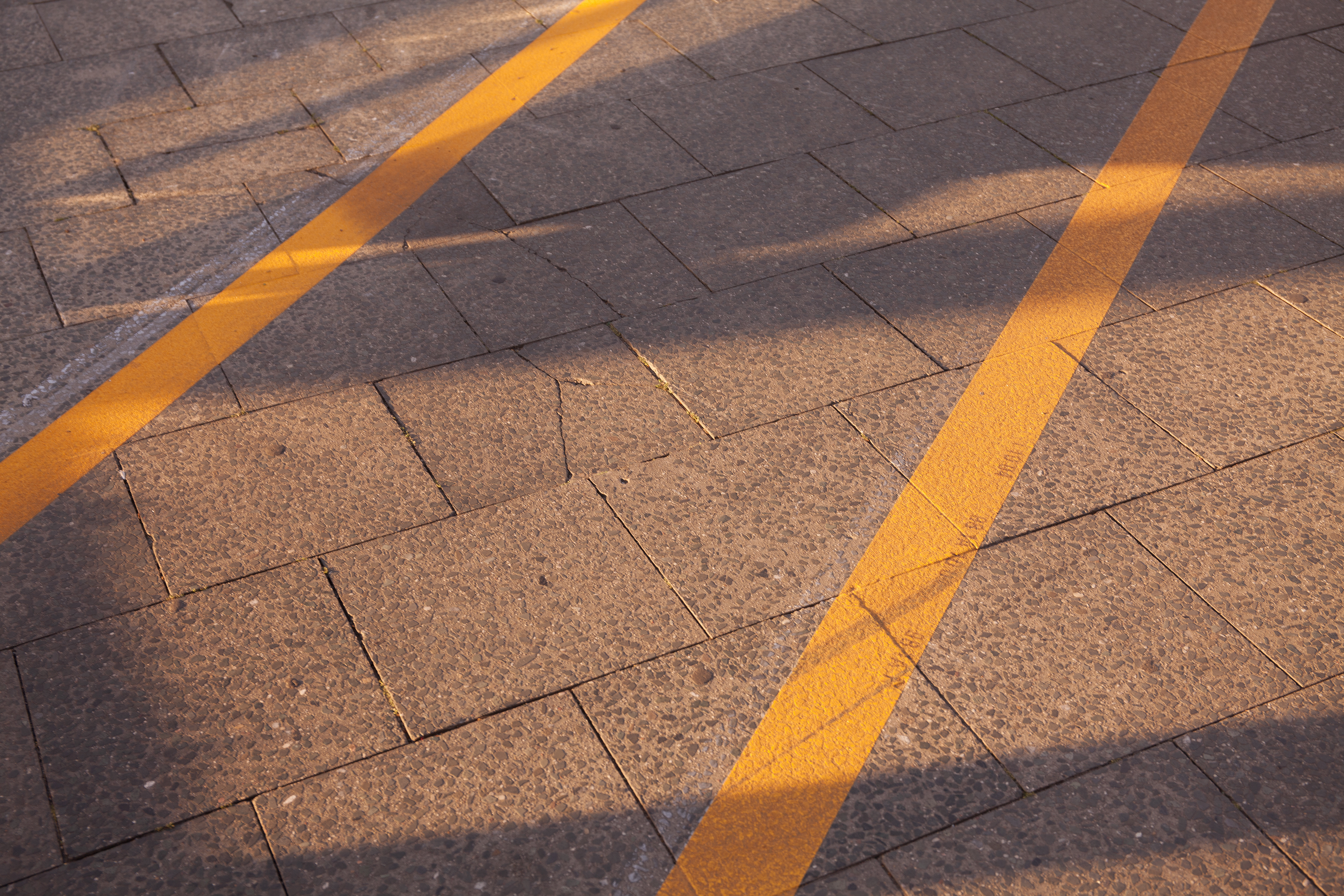 Yellow lines in empty road. Berlin, Germany.