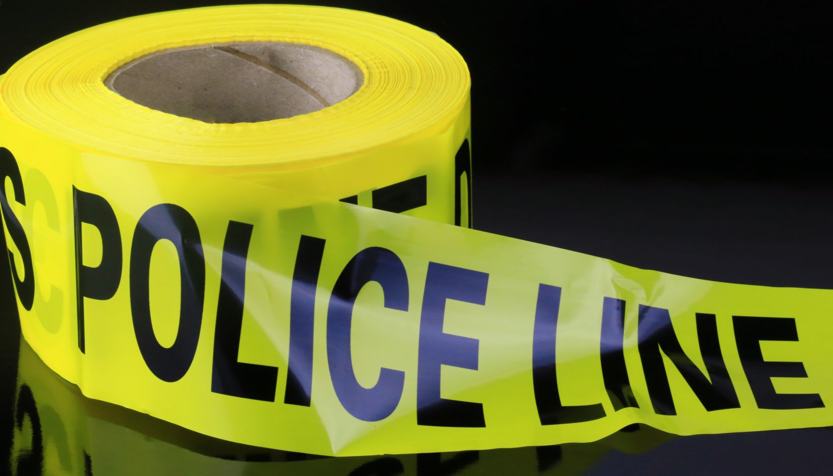 Roll of yellow police caution Tape