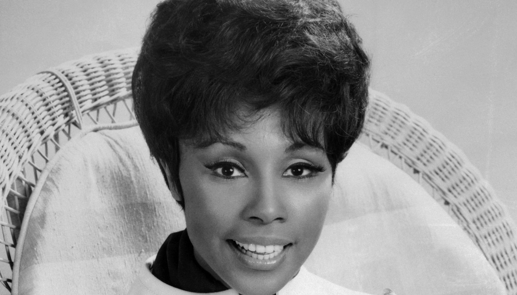 Diahann Carroll Sitting with Hands Clasped