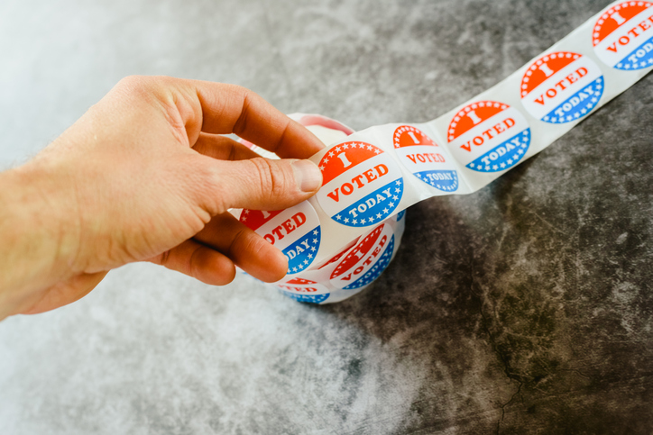 Close-Up Of Hand Holding Text