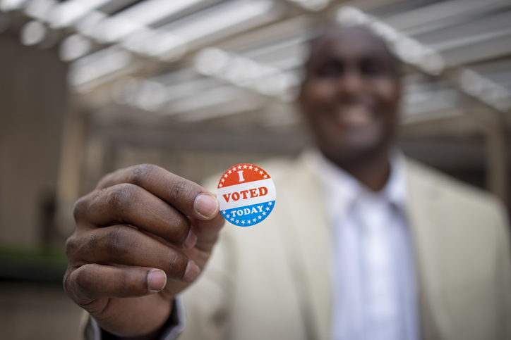 Young Black Man with I voted Sticker