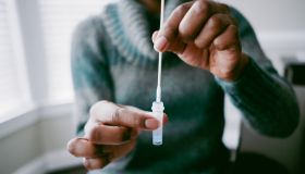 Woman Takes At-Home COVID Test