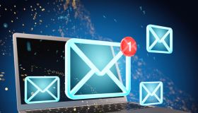 You've Got Mail. E-mail Icons over a Laptop