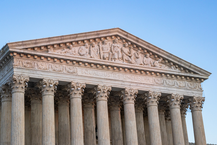 Supreme Court Building pediment at dusk