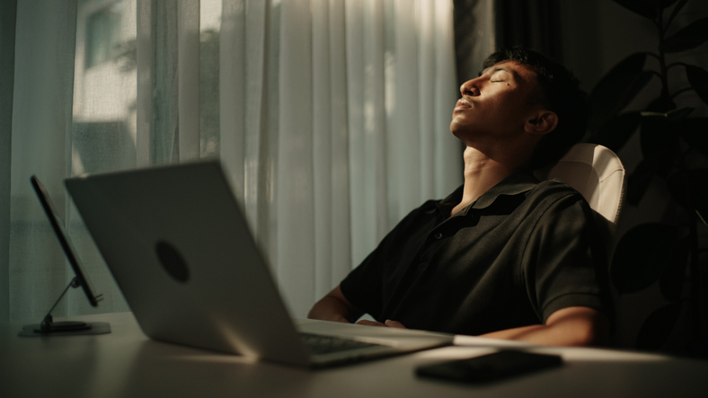Man resting peacefully during work.