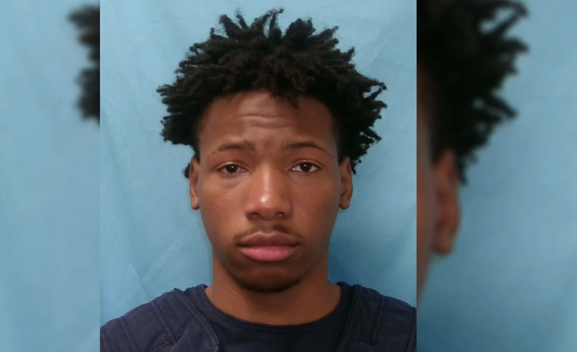 Headshot of a young Black man with short, curly hair and a serious expression against a teal background.