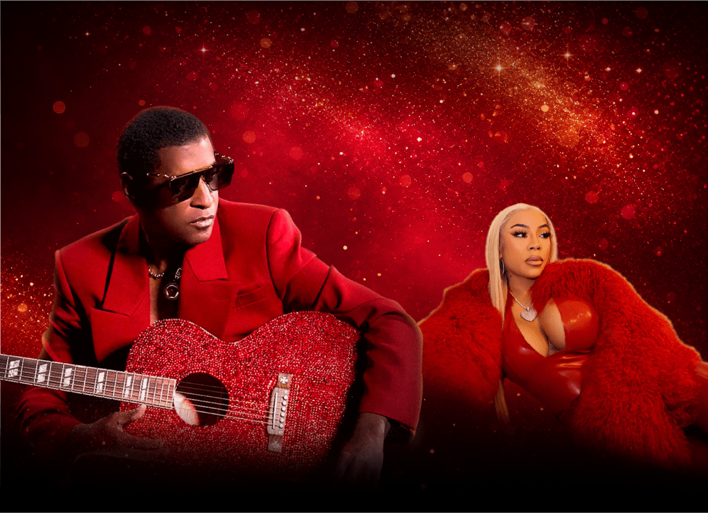Two people wearing red outfits and sunglasses posing in front of a sparkling red and gold background, one holding a red guitar.
