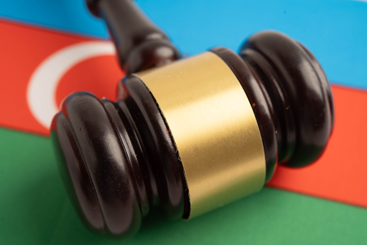 Azerbaijan law, Legal, justice and agreement, wooden court gavel on flag.
