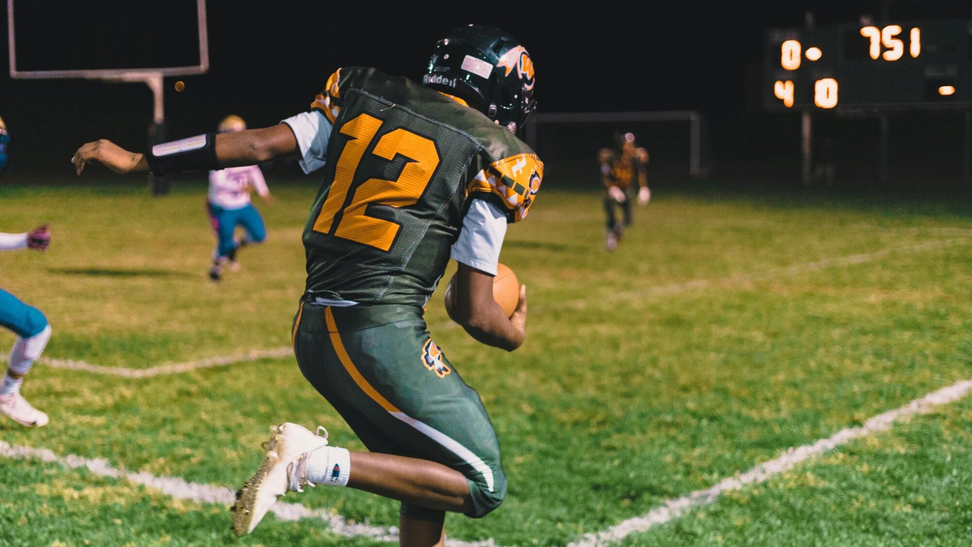 Football programs are boosting recruiting strategy with custom jerseys